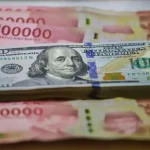 Ilustrasi nilai tukar rupiah terhadap dolar AS yang mengalami pelemahan
