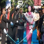 Prosesi pergantian kepemimpinan Kapolresta Banjarmasin dari Kombes Pol Cuncun Kurniadi kepada Kombes Pol Riza Muttaqin