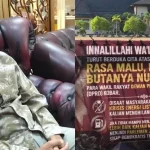 Spanduk kritik warga di pagar Kantor DPRD Kotawaringin Barat mengenai krisis listrik dan BBM