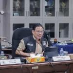 Suasana rapat di DPRD Kalimantan Selatan terkait pembahasan investasi dan kesejahteraan masyarakat.