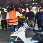 Personel Polsek Banjarmasin Utara melakukan patroli humanis dan berdialog dengan warga Sungai Miai Dalam