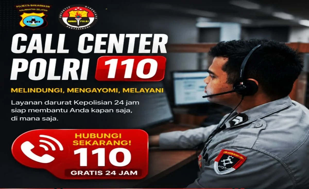 Petugas kepolisian sedang melayani laporan masyarakat melalui sistem Call Center 110.