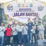 Suasana kemeriahan kegiatan jalan santai dalam rangka Dies Natalis ke-68 Universitas Lambung Mangkurat